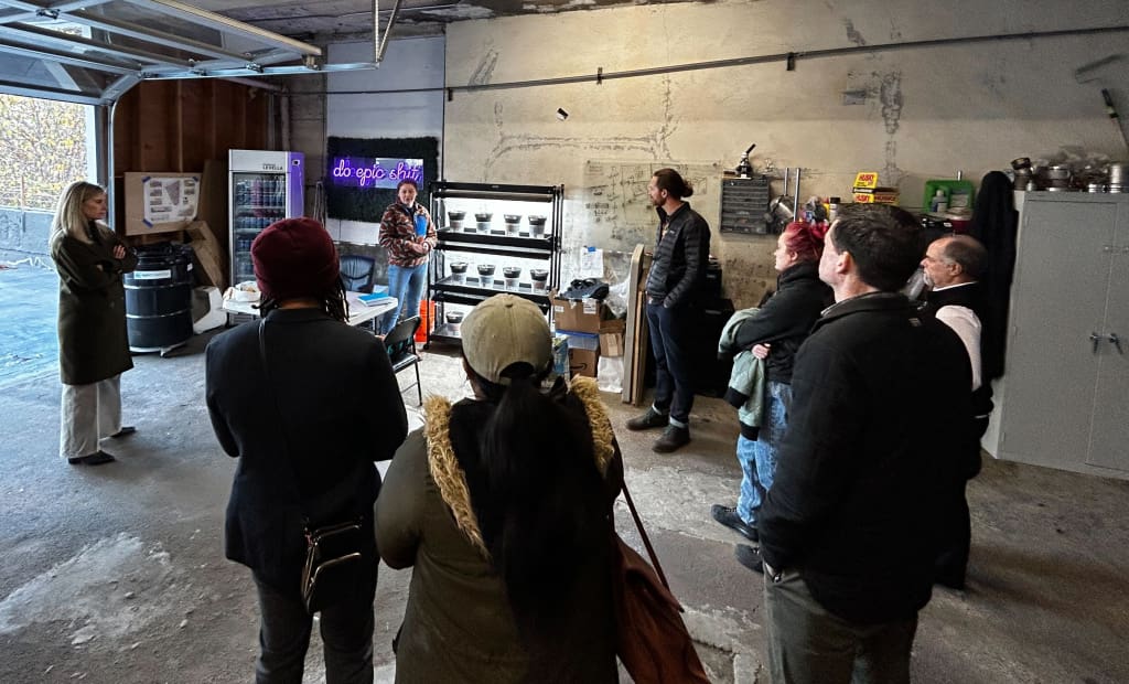 A group tours Epic's Hub location in downtown San Francisco